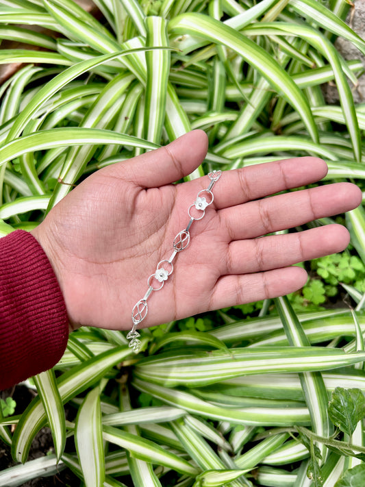 Pulsera dos circulos con flor eslabon entorchado con infinito - Plata