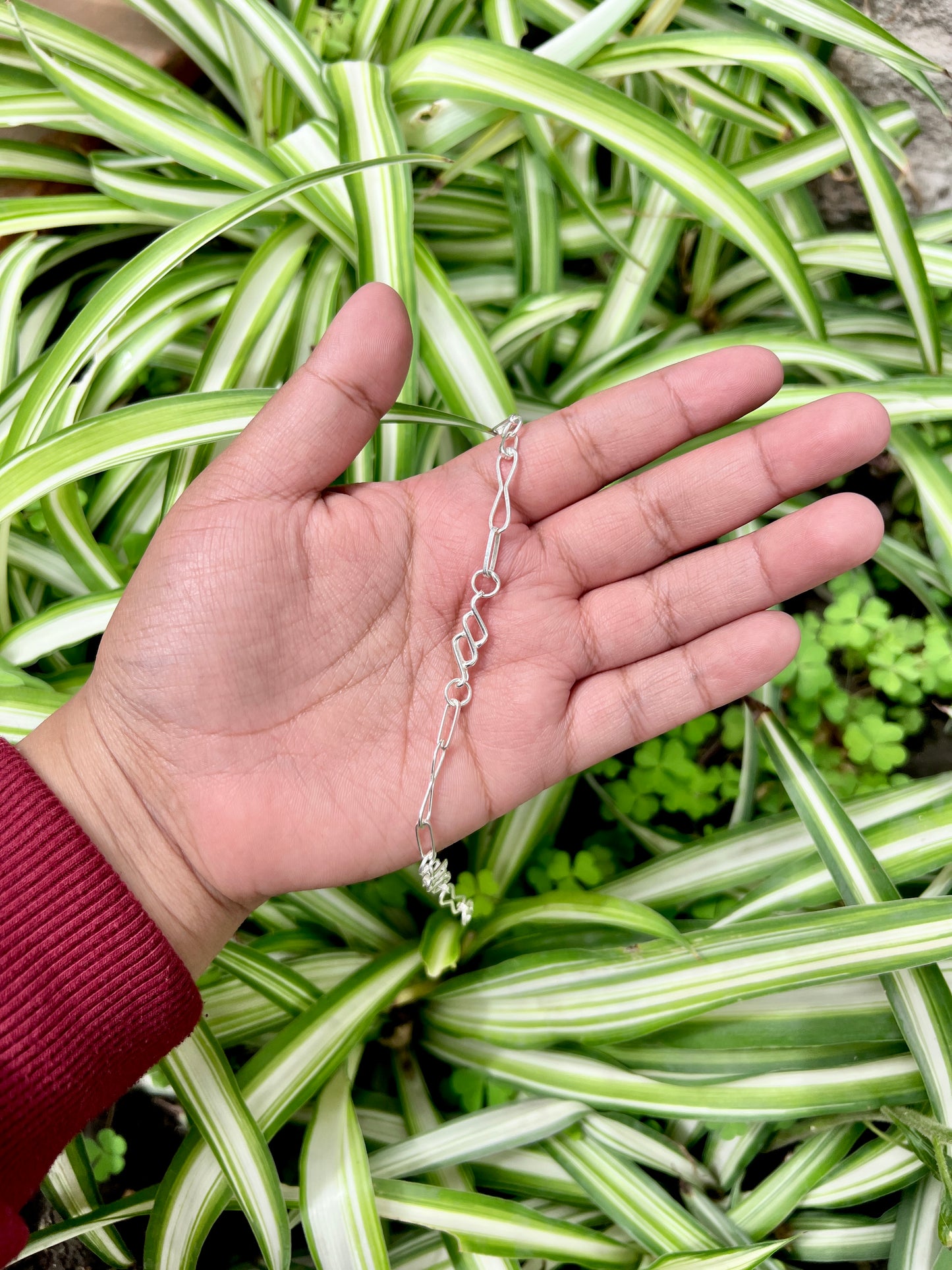 Pulsera con infinito y eslabon doble hoja  - Plata