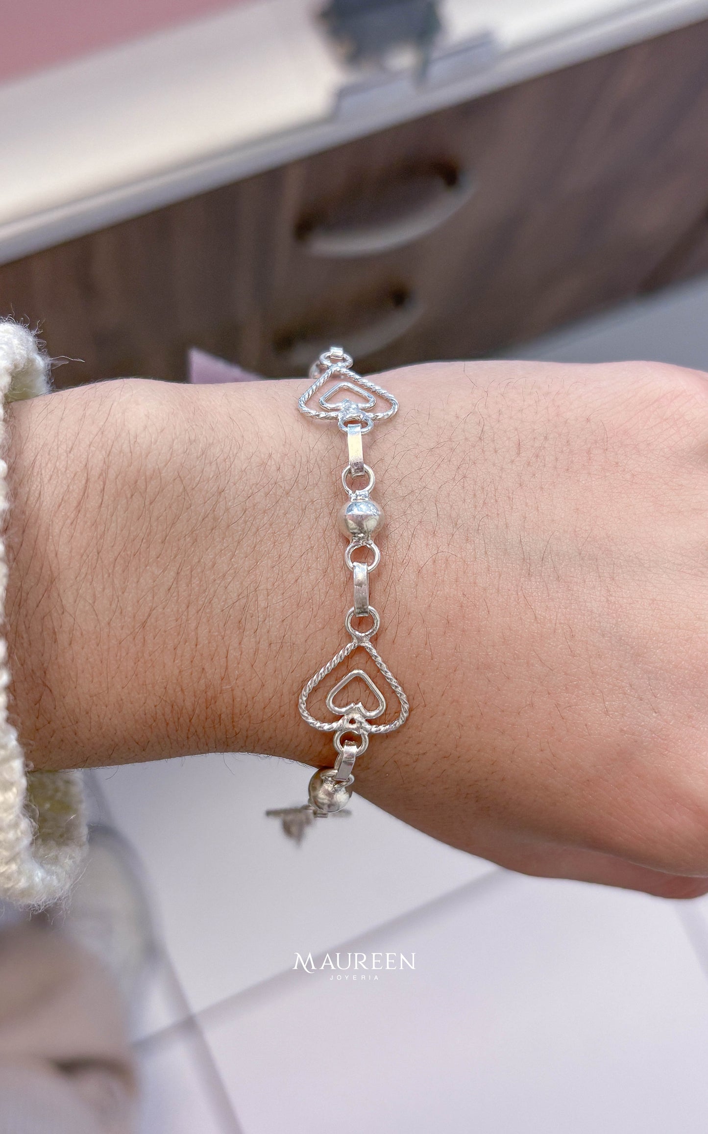 Pulsera corazón tejido - plata