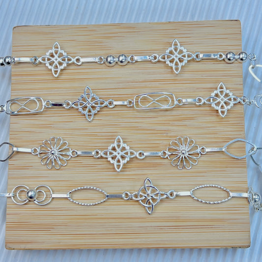 Pulseras delgadas nudo de bruja - plata