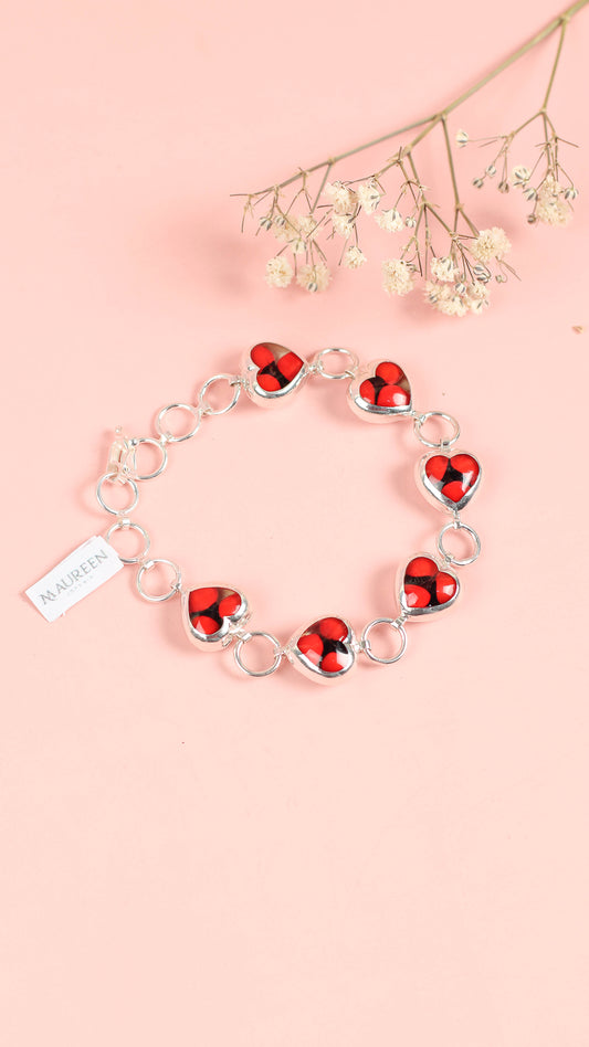 Pulsera corazon bombacho huayruro - Plata