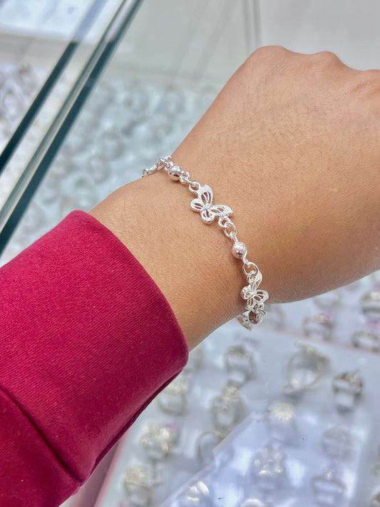 Pulsera mariposas y esferas - plata