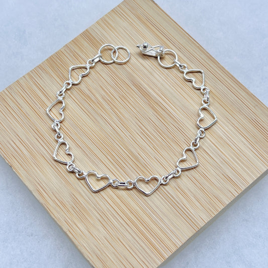 Pulsera corazones calados - plata