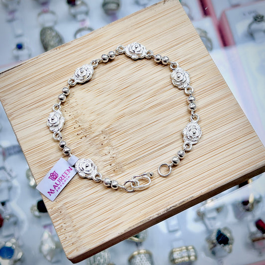 Pulsera de rosas y esferas - plata