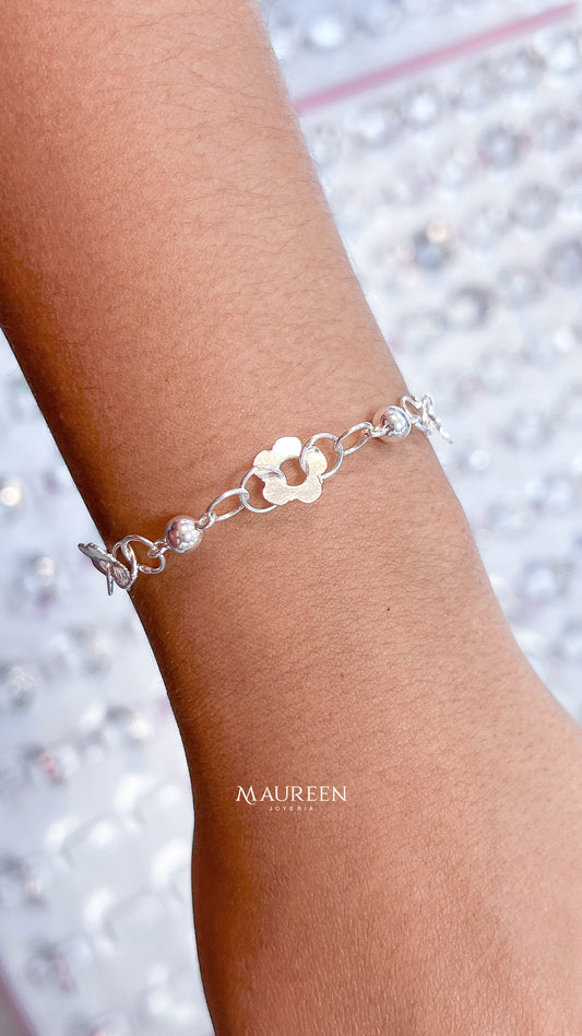 Pulsera flores y argollas - plata