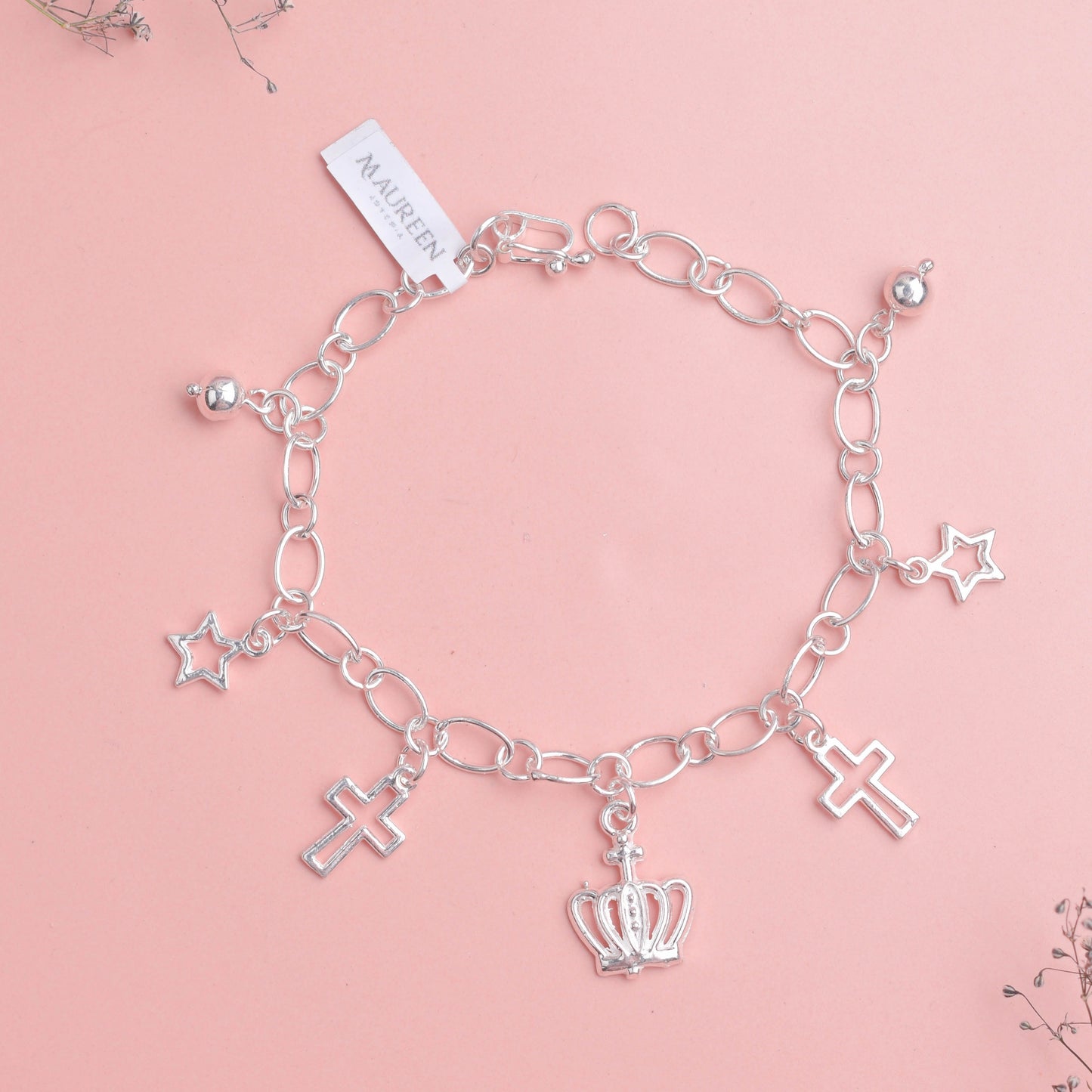 Pulsera dijes corona, cruz y estrella - Plata