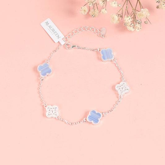Pulsera  flores opalo celeste con circones - Plata