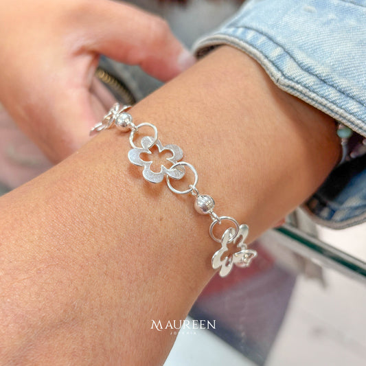 Pulsera flores con argollas y esferas -  Plata