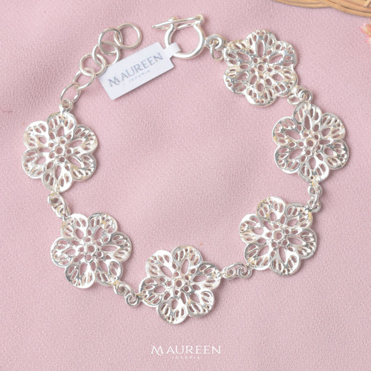 Pulsera de flores tejidas - Plata