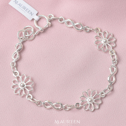 Pulsera flor calada con infinitos - Plata