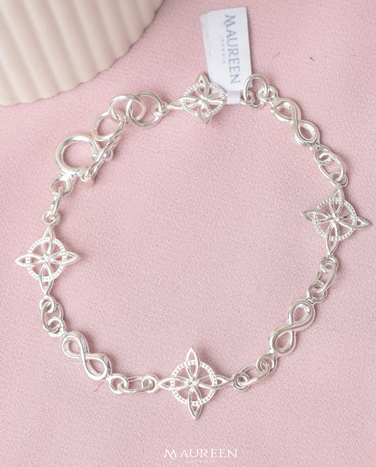 Pulsera nudo de bruja calado con infinitos - Plata