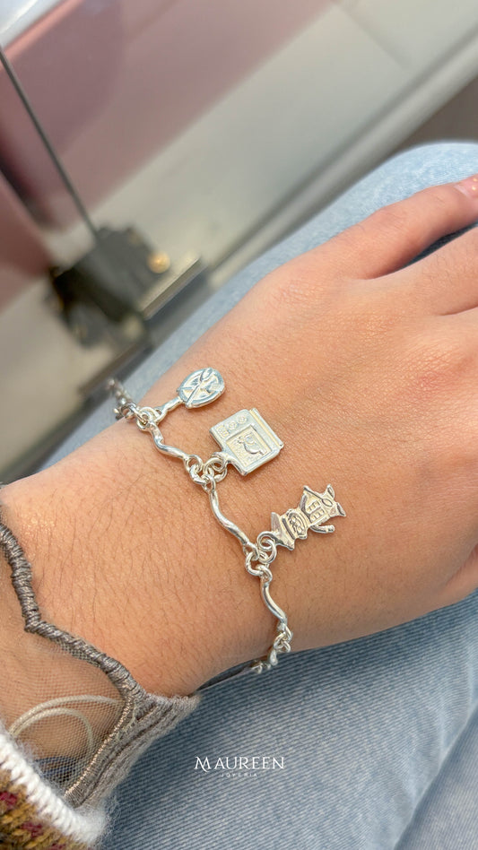 Pulsera fideos con dijes de reposteria - plata