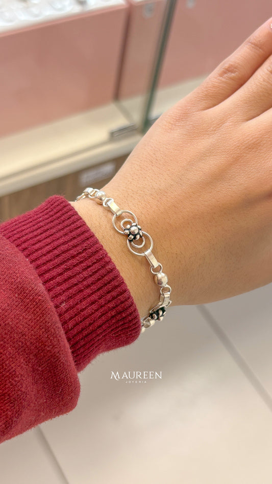 Pulsera flor plata quemada y corazones con relieve intercalado - plata