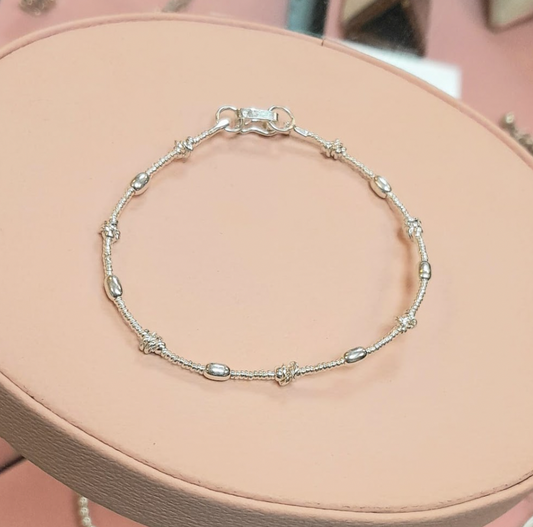 Pulsera chaquira, nudo y arroz - Plata
