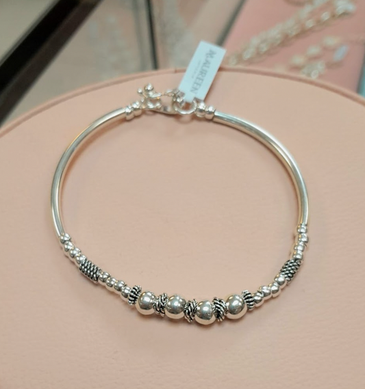 Pulsera rigida con esferas, donas entorchadas y tubo liso - Plata quemada
