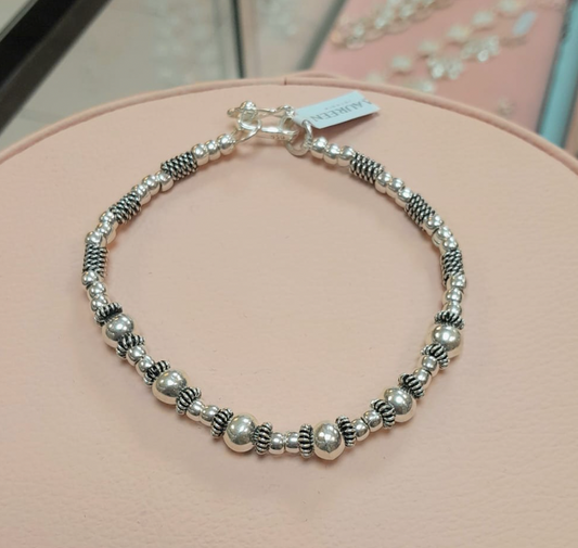 Pulsera rigida entorchada con 3 donas lisas y 6 esferas - Plata quemada